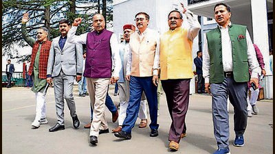 Leader of Opposition Jai Ram Thakur, along with BJP legislators, staging a walkout from the assembly on Thursday. (Deepak Sansta/HT)
