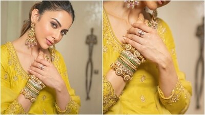 The gharara pants feature a pleated floor-sweeping ghera and gold gota patti embroidery on the hem. She accessorised the ensemble with embroidered juttis, an embellished potli bag in a cream shade, polki bangles and bracelets, matching jhumkis, and statement rings. (Instagram) The gharara pants feature a pleated floor-sweeping ghera and gold gota patti embroidery on the hem. She accessorised the ensemble with embroidered juttis, an embellished potli bag in a cream shade, polki bangles and bracelets, matching jhumkis, and statement rings. (Instagram)