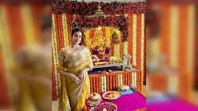 Janhvi Kapoor looked stunning in a beautiful yellow silk saree with detailed jewel border work. She posed in front of a Lord Ganesha idol. (Instagram/@janhvikapoor) Janhvi Kapoor looked stunning in a beautiful yellow silk saree with detailed jewel border work. She posed in front of a Lord Ganesha idol. (Instagram/@janhvikapoor)