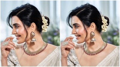 In oxidised golden jhumkas, a neck choker, a statement ring and a bracelet from the shelves of Sangeeta Boochra, Karishma further accessorised her look for the day. "Forever a saree girl," Karishma declared her love for sarees with this caption.&nbsp; (Instagram/@karishmaktanna)