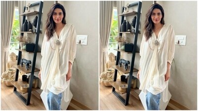 Karishma's fusion fashion diaries are equally loved by her fans. A few days back, the actor aced a white kaftan-styled kurta with a pair of denims and showed us how it is done.&nbsp; (Instagram/@karishmaktanna)