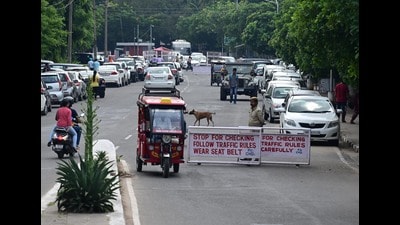 Cars lined up on the roadside near Gate Number 2 in the absence of parking arrangements on the Panjab University campus. (Ravi Kumar/HT) Cars lined up on the roadside near Gate Number 2 in the absence of parking arrangements on the Panjab University campus. (Ravi Kumar/HT)