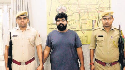Cow vigilante and Bajrang Dal Monu Manesar was handed over to the Rajasthan Police in connection with the killing of two Muslim men in Bhiwani. (HT Photo) Cow vigilante and Bajrang Dal Monu Manesar was handed over to the Rajasthan Police in connection with the killing of two Muslim men in Bhiwani. (HT Photo)