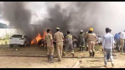 Firefighters trying to douse the fire on Friday (HT Photo)