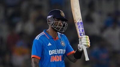 India's Suryakumar Yadav raises his bat as he celebrates scoring a fifty. (AP) India's Suryakumar Yadav raises his bat as he celebrates scoring a fifty. (AP)