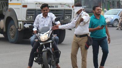 Police take action against those flouting helmet norms. (Ravindra Joshi/HT PHOTO)