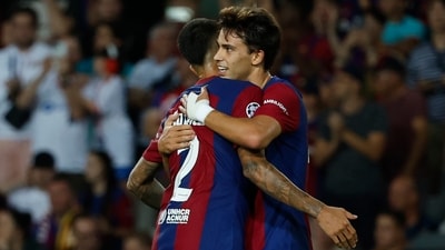 Barcelona's Joao Felix, right, celebrates with his teammate Joao Cancelo after scoring. (AP) Barcelona's Joao Felix, right, celebrates with his teammate Joao Cancelo after scoring. (AP)
