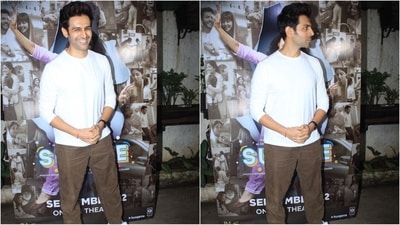 Kartik Aryan kept his look understated and wore a basic white T-shirt with full sleeves. He paired it with a pair of brown denim jeans and white sneakers. With his perfectly groomed look and charming smile, he looked handsome. (HT Photo/VarinderChawla) Kartik Aryan kept his look understated and wore a basic white T-shirt with full sleeves. He paired it with a pair of brown denim jeans and white sneakers. With his perfectly groomed look and charming smile, he looked handsome. (HT Photo/VarinderChawla)