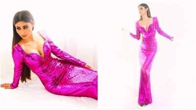 Mouni Roy is proving her fashion savvy with her back-to-back head-turning looks. Whether it's a casual beach look or a red carpet-worthy gown, Mouni can pull off any look to perfection. The actress is quite active on social media and her Insta-diaries filled with stylish looks are nothing short of a treasure trove of fashion inspiration for all her followers. Her latest look is no exception, as the actress goes all smoke and mirrors in a glamorous bright pink dress. Read on to take some fashion notes from the style diva. (Instagram/@imouniroy) Mouni Roy is proving her fashion savvy with her back-to-back head-turning looks. Whether it's a casual beach look or a red carpet-worthy gown, Mouni can pull off any look to perfection. The actress is quite active on social media and her Insta-diaries filled with stylish looks are nothing short of a treasure trove of fashion inspiration for all her followers. Her latest look is no exception, as the actress goes all smoke and mirrors in a glamorous bright pink dress. Read on to take some fashion notes from the style diva. (Instagram/@imouniroy)