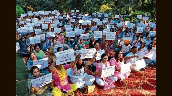 Government school teachers protesting near the Sector 20 mosque in Chandigarh on Thursday. (Ravi Kumar/HT)