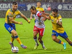 Danish Farooq of Kerala Blasters FC and Namgyal Bhutia of Bengaluru FC and Aibanbha Kupar Dohling of Kerala Blasters FC in action Danish Farooq of Kerala Blasters FC and Namgyal Bhutia of Bengaluru FC and Aibanbha Kupar Dohling of Kerala Blasters FC in action