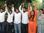 ABVP's Tushar Dedha (president), Aparajita (secretary) and Sachin Baisla (joint secretary) and others after they won in the DUSU election 2023, in New Delhi, Saturday, Sept. 23.