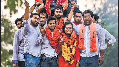ABVP candidates Tushar Dedha, Aprajiita and Sachin Baisla celebrate after their win in the DUSU elections on Saturday. (Raj K Raj/HT PHOTO) ABVP candidates Tushar Dedha, Aprajiita and Sachin Baisla celebrate after their win in the DUSU elections on Saturday. (Raj K Raj/HT PHOTO)