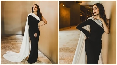 Malaika Arora exudes grace and sophistication in a breathtaking one-shoulder black and white gown. The fitness and fashion aficionado once again captivated her followers by sharing a series of photos showcasing her elegance in this monochromatic ensemble. (Instagram/@malaikaaroraofficial) Malaika Arora exudes grace and sophistication in a breathtaking one-shoulder black and white gown. The fitness and fashion aficionado once again captivated her followers by sharing a series of photos showcasing her elegance in this monochromatic ensemble. (Instagram/@malaikaaroraofficial)