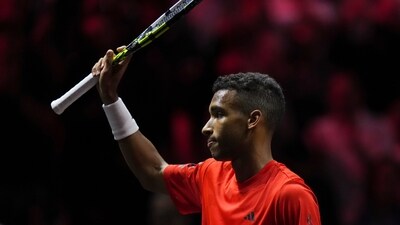 Team World's Felix Auger-Aliassime acknowledges the crowd after defeating Team Europe's Gael Monfils during a Laver Cup tennis match Friday, Sept. 22 (AP) Team World's Felix Auger-Aliassime acknowledges the crowd after defeating Team Europe's Gael Monfils during a Laver Cup tennis match Friday, Sept. 22 (AP)
