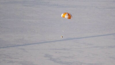 A training model of the OSIRIS-REx sample return capsule is seen during a drop test. (NASA/Keegan Barber) A training model of the OSIRIS-REx sample return capsule is seen during a drop test. (NASA/Keegan Barber)