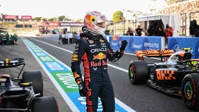 Red Bull Racing's Dutch driver Max Verstappen celebrates after taking poll position in the qualifying session for the Formula One Japanese Grand Prix (AFP)
