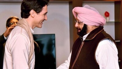 Canadian Prime Minister Justin Trudeau shakes hands with Punjab chief minister Amarinder Singh in Amritsar. (PTI Photo) Canadian Prime Minister Justin Trudeau shakes hands with Punjab chief minister Amarinder Singh in Amritsar. (PTI Photo)