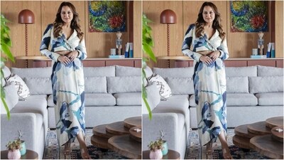 For her second look, Sonkshi chose an ensemble by Advait. It featured a jacket-style top with a V-neckline and full sleeves, adorned with a mesmerising print in shades of blue. She paired it with a matching printed draped skirt. (Instagram/@aslisona) For her second look, Sonkshi chose an ensemble by Advait. It featured a jacket-style top with a V-neckline and full sleeves, adorned with a mesmerising print in shades of blue. She paired it with a matching printed draped skirt. (Instagram/@aslisona)