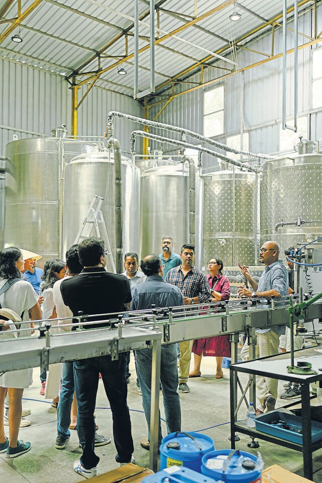 Visitors take a tour of the Moonshine Meadery plant in Pune. Visitors take a tour of the Moonshine Meadery plant in Pune.