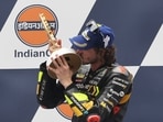 Mooney VR46 Racing Team's Marco Bezzecchi celebrates with the trophy on the podium after winning the MotoGP(REUTERS)