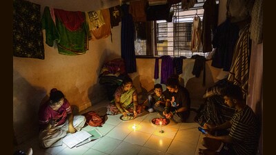 “Due to the absence of electricity and ventilation, children sleep in the passages and corridors of the building for air,” said Pradeep Patekar, a seventh-floor resident from E wing. “Women cook in the dark and use their cell phone light or torch to illuminate the rooms.” (Satish Bate/ HT PHOTO) “Due to the absence of electricity and ventilation, children sleep in the passages and corridors of the building for air,” said Pradeep Patekar, a seventh-floor resident from E wing. “Women cook in the dark and use their cell phone light or torch to illuminate the rooms.” (Satish Bate/ HT PHOTO)