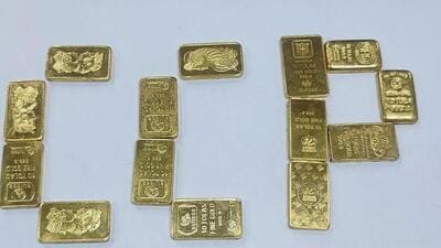 Customs officials said that 14 pieces of gold, packed in two plastic pouches, were recovered from a vehicle intercepted at Jhalupara, Shillong, on Saturday. (Sourced) Customs officials said that 14 pieces of gold, packed in two plastic pouches, were recovered from a vehicle intercepted at Jhalupara, Shillong, on Saturday. (Sourced)