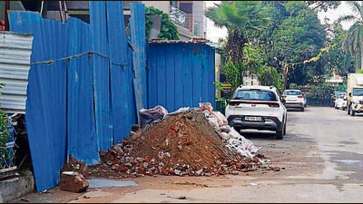 Debris outside a house in the city as MC failed to commence the mechanical work of the C&D waste management plant in stipulated time. (Manish/HT)