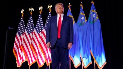 FILE - Former President Donald Trump stands on stage before speaking at a campaign event, July 8, 2023, in Las Vegas. The Nevada Republican Party has approved new rules for their presidential caucus that many suspect are meant to help former President Donald Trump. The provisions would bar any candidate from the Feb. 8 caucus if they participate in the state-run primary two days earlier. (AP Photo/John Locher, File) (AP) FILE - Former President Donald Trump stands on stage before speaking at a campaign event, July 8, 2023, in Las Vegas. The Nevada Republican Party has approved new rules for their presidential caucus that many suspect are meant to help former President Donald Trump. The provisions would bar any candidate from the Feb. 8 caucus if they participate in the state-run primary two days earlier. (AP Photo/John Locher, File) (AP)