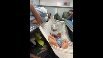 The image shows a passenger sleeping in a makeshift hammock. (Instagram/@hathim_ismayil) The image shows a passenger sleeping in a makeshift hammock. (Instagram/@hathim_ismayil)