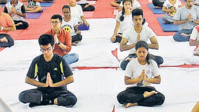 Mumbai, India - June 21 2016: Students perform Yoga during International Yoga Day at R.D. National College, Bandra in Mumbai, India, on Tuesday, June 21, 2016. (Photo by Pramod Thakur/ Hindustan Times) (Hindustan Times) Mumbai, India - June 21 2016: Students perform Yoga during International Yoga Day at R.D. National College, Bandra in Mumbai, India, on Tuesday, June 21, 2016. (Photo by Pramod Thakur/ Hindustan Times) (Hindustan Times)