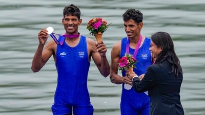 Silver medal winners India's Arjun Lal Jat and Arvind Singh being honoured during the medal ceremony of Men's Light-weight Double Sculls event (PTI) Silver medal winners India's Arjun Lal Jat and Arvind Singh being honoured during the medal ceremony of Men's Light-weight Double Sculls event (PTI)