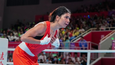 India's Nikhat Zareen celebrates win against Vietnam's Thi Tam Nguyen in the women's 50 kg boxing preliminaries at the 19th Asian Games (PTI) India's Nikhat Zareen celebrates win against Vietnam's Thi Tam Nguyen in the women's 50 kg boxing preliminaries at the 19th Asian Games (PTI)