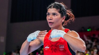 Nikhat Zareen reacts after her win against Vietnam's Thi Tam Nguyen in women's 50 kg boxing preliminaries at the 19th Asian Games (PTI) Nikhat Zareen reacts after her win against Vietnam's Thi Tam Nguyen in women's 50 kg boxing preliminaries at the 19th Asian Games (PTI)