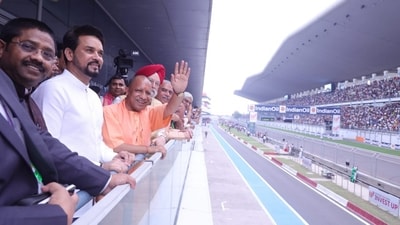 UP Chief Minister Yogi Adityanath and Union Ministers Anurag Thakur and Hardeep Singh Puri during the MotoGP Grand Prix of India at the Buddh International Circuit, Greater Noida (PTI) UP Chief Minister Yogi Adityanath and Union Ministers Anurag Thakur and Hardeep Singh Puri during the MotoGP Grand Prix of India at the Buddh International Circuit, Greater Noida (PTI)