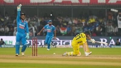 David Warner fell for 53 off 39 as Australia's target was changed to 317 to be chased in 33 overs&nbsp; (PTI)