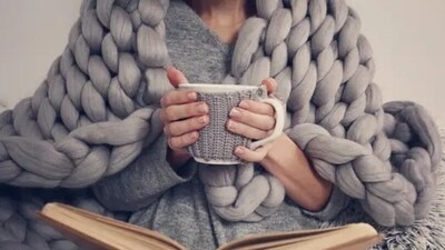 Rolling inside our favourite sweaters or blankets can help us feel safe and happy.&nbsp; (Unsplash)