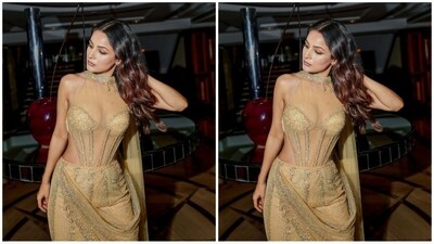 With the assistance of hairstylist Baljit Cheema, Shehnaaz styled her lustrous locks into soft curls, leaving them open at the centre, cascading beautifully down her shoulders. (Instagram/@shehnaazgill) With the assistance of hairstylist Baljit Cheema, Shehnaaz styled her lustrous locks into soft curls, leaving them open at the centre, cascading beautifully down her shoulders. (Instagram/@shehnaazgill)