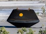 The return capsule containing a sample collected from the asteroid Bennu in October 2020 by NASA’s OSIRIS-REx spacecraft is seen shortly after touching down in the desert at the Department of Defense's Utah Test and Training Range in Dugway, Utah, U.S. September 24, 2023.  NASA/Keegan Barber/Handout via REUTERS 