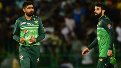 Pakistan's captain Babar Azam (L) reacts as he walks back to the pavilion (AFP) Pakistan's captain Babar Azam (L) reacts as he walks back to the pavilion (AFP)