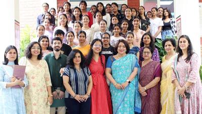 Chandigarh Literary Society (CLS) chairperson Sumita Misra (centre) with staff and students of Mehr Chand Mahajan DAV College for Women in Chandigarh. (HT Photo)