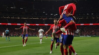 Atletico Madrid players celebrate their second goal scored by Atletico Madrid's French forward #07 Antoine Griezmann during the Spanish Liga football match (AFP) Atletico Madrid players celebrate their second goal scored by Atletico Madrid's French forward #07 Antoine Griezmann during the Spanish Liga football match (AFP)