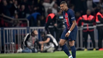 Paris Saint-Germain's French forward #07 Kylian Mbappe grimaces during the French L1 football match against Olympique de Marseille (AFP)