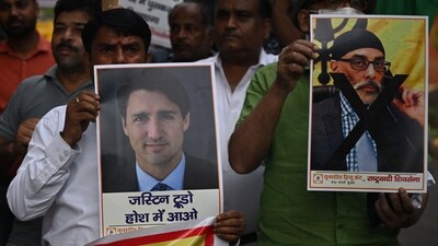 Members of United Hindu Front organisation hold banners depicting Justin Trudeau Canada's Prime Minister (L) and Gurpatwant Singh Pannun, a designated Khalistani terrorist, during a rally in New Delhi. (AFP) Members of United Hindu Front organisation hold banners depicting Justin Trudeau Canada's Prime Minister (L) and Gurpatwant Singh Pannun, a designated Khalistani terrorist, during a rally in New Delhi. (AFP)