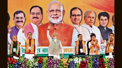 PM Modi, accompanied by Union ministers Jyotiraditya Scindia, Narendra Singh Tomar, MP chief minister Shivraj Singh Chouhan and state BJP President VD Sharma in Bhopal on Monday. (PTI) PM Modi, accompanied by Union ministers Jyotiraditya Scindia, Narendra Singh Tomar, MP chief minister Shivraj Singh Chouhan and state BJP President VD Sharma in Bhopal on Monday. (PTI)