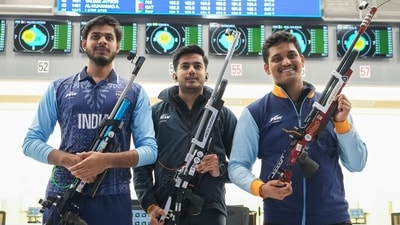 Indian shooters Rudrankksh Patil (right), Aishwary Pratap Singh Tomar (centre) and Divyansh Singh Panwar pose for photos after winning gold in the Men's 10m Air Rifle team event (PTI) Indian shooters Rudrankksh Patil (right), Aishwary Pratap Singh Tomar (centre) and Divyansh Singh Panwar pose for photos after winning gold in the Men's 10m Air Rifle team event (PTI)