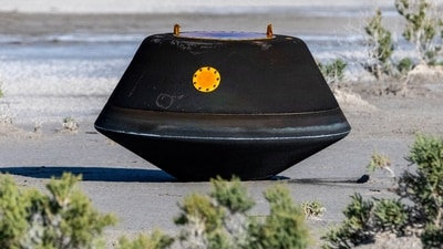 The return capsule containing a sample collected from the asteroid Bennu in October 2020 by NASA’s OSIRIS-REx spacecraft is seen shortly after touching down in the desert at the Department of Defense's Utah Test and Training Range in Dugway, Utah, U.S. September 24, 2023.  NASA/Keegan Barber/Handout via REUTERS (via REUTERS)