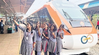 Students take selfies with the newly flagged off Vande Bharat train, at Kasaragod station in Kerala on Sunday. (PTI) Students take selfies with the newly flagged off Vande Bharat train, at Kasaragod station in Kerala on Sunday. (PTI)