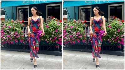 Manushi looked gorgeous as ever in the multicoloured slip floral gown with a cowl neckline. The gown featured bodycon details and the actor looked absolutely ravishing in it. (Instagram/@manushi_chhillar) Manushi looked gorgeous as ever in the multicoloured slip floral gown with a cowl neckline. The gown featured bodycon details and the actor looked absolutely ravishing in it. (Instagram/@manushi_chhillar)