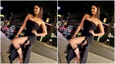 Manushi looked stunning in the off-shoulder black gown with bodycon details and thigh high slits in both sides, decorated in frills. (Instagram/@manushi_chhillar) Manushi looked stunning in the off-shoulder black gown with bodycon details and thigh high slits in both sides, decorated in frills. (Instagram/@manushi_chhillar)